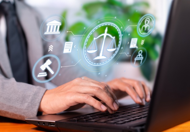 Attorney using a laptop computer to review privileged documents.